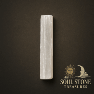 White selenite crystal with natural striations and textured surface
