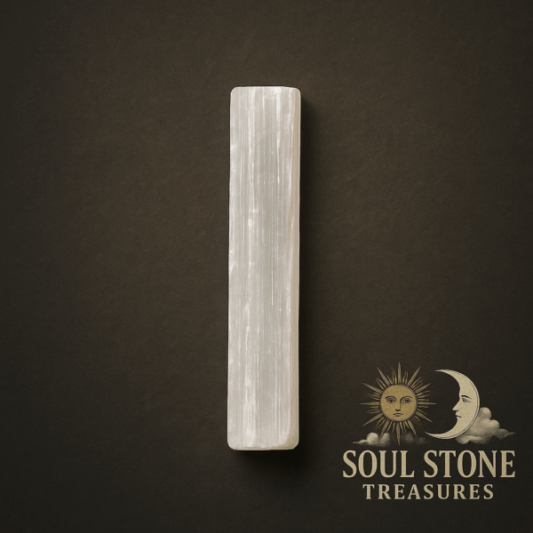 White selenite crystal with natural striations and textured surface